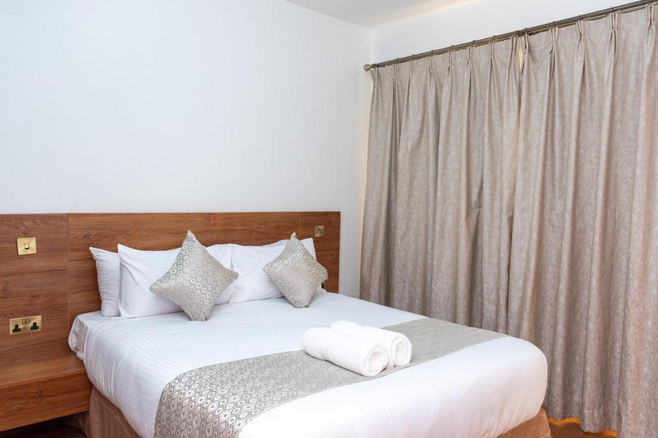 CySuites Apartment Hotel Nairobi Buitenkant foto